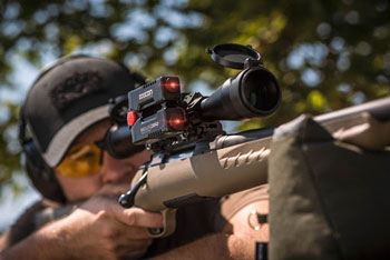 The Axeon Absolute Zero mounted on a rifle scope